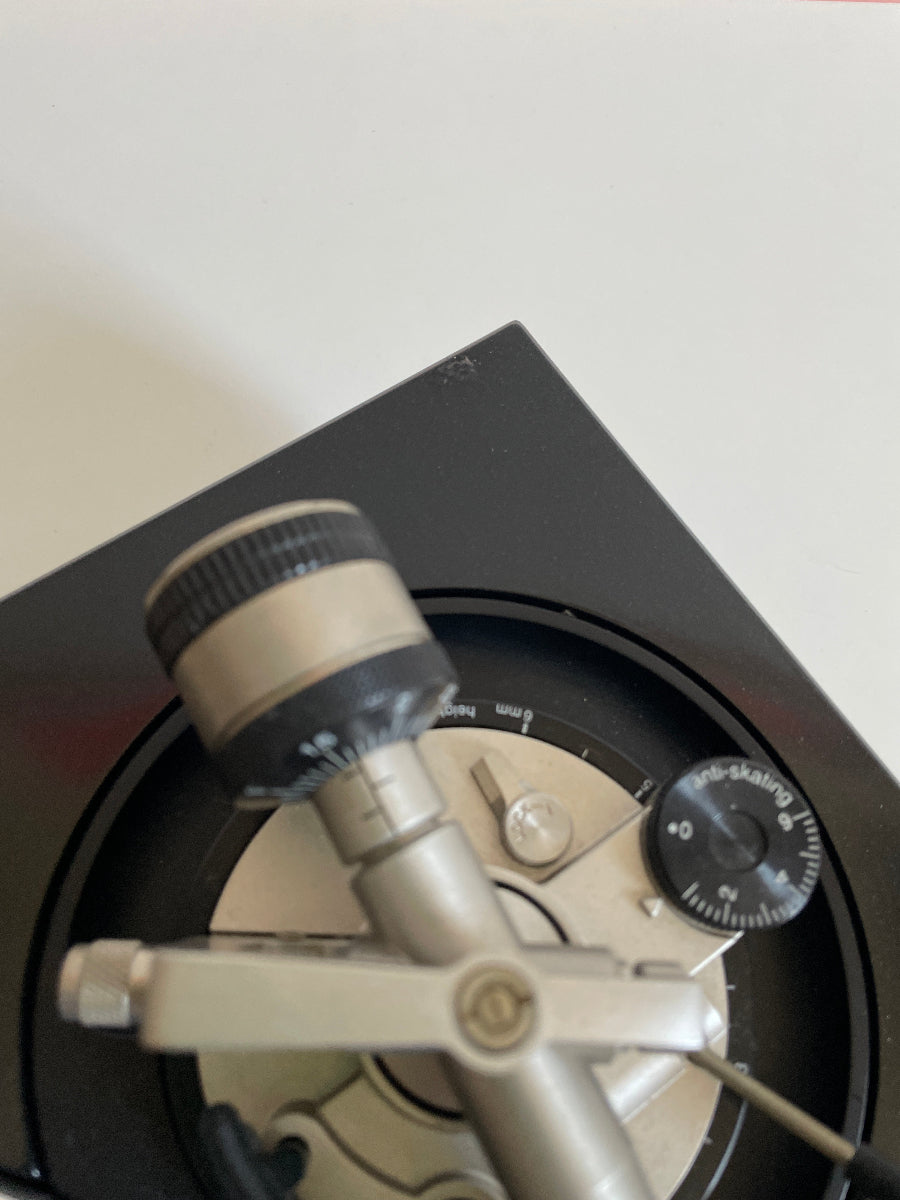 Close-up of a turntable on a white background