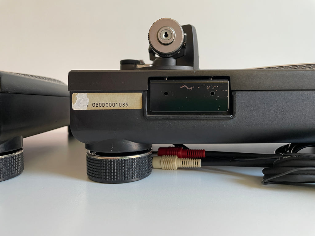 Close-up of a turntable with a white background