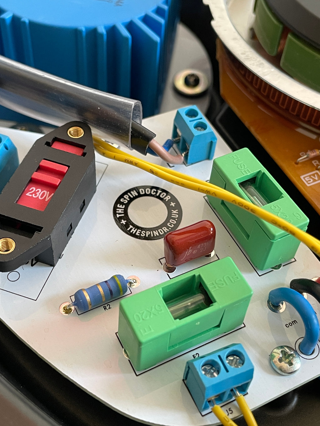 Close-up of electronic components on a circuit board with visible text and labels.