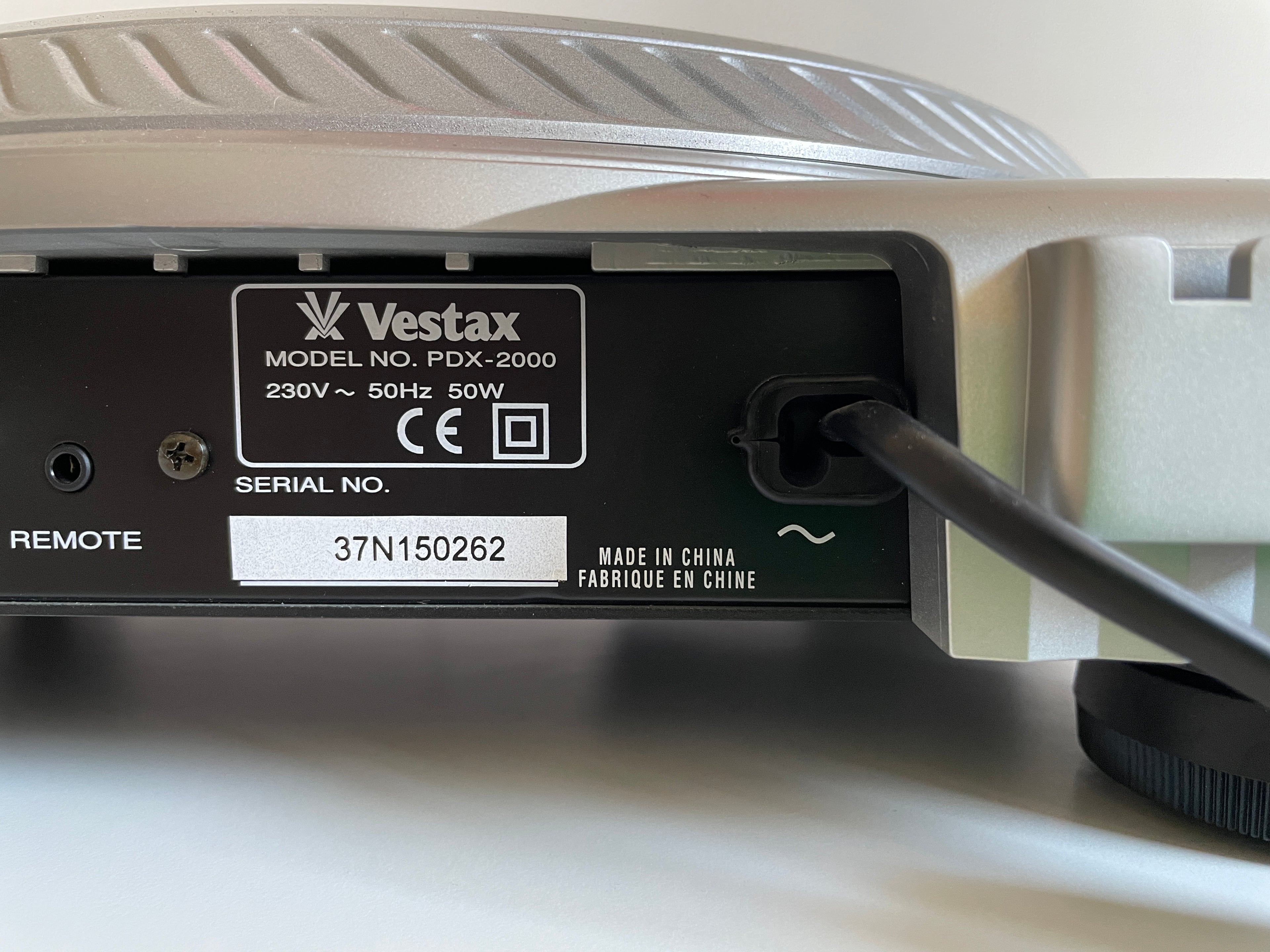 Back of a Vestax PDX-2000 turntable with branding and specifications.