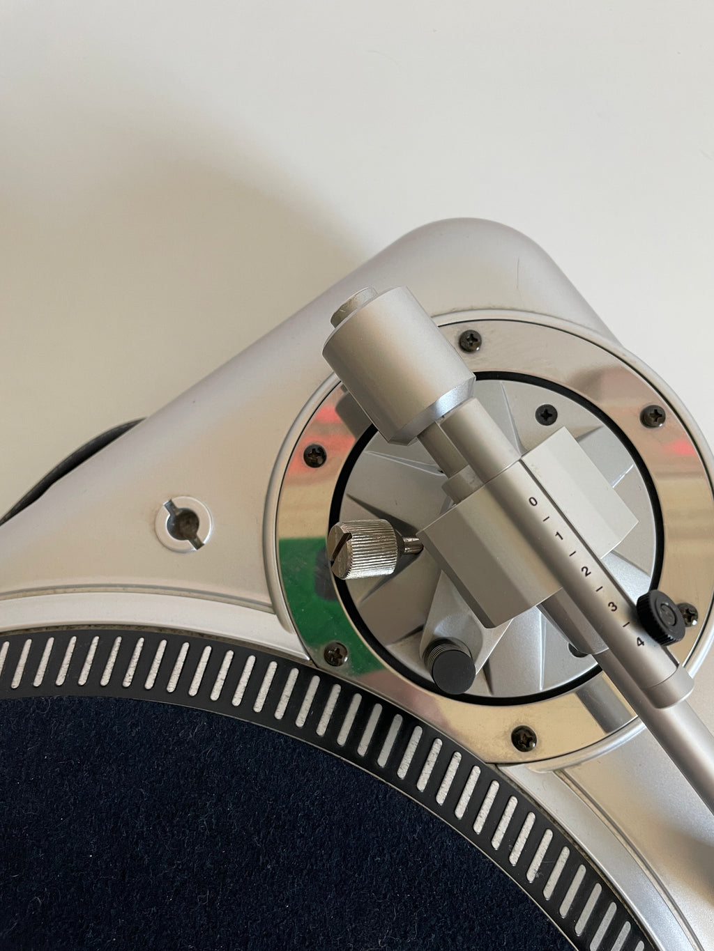 Close-up of a turntable cartridge on a white background