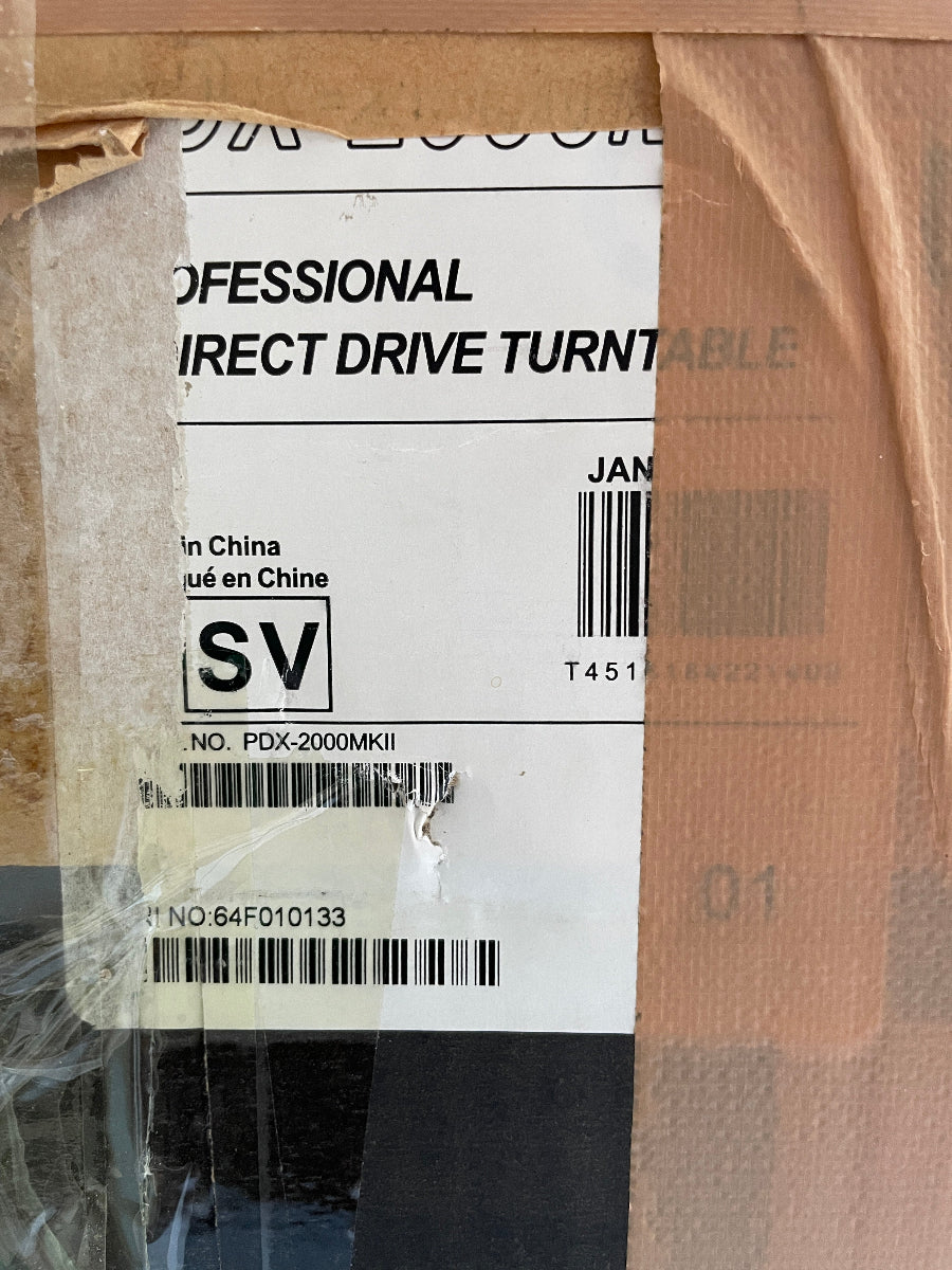 Close-up of a product package with a label on cardboard